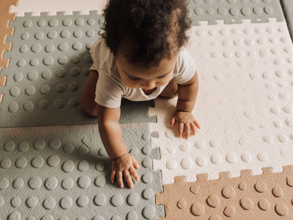 infant_playing_on_sensory_mat_with_textured_surfaces